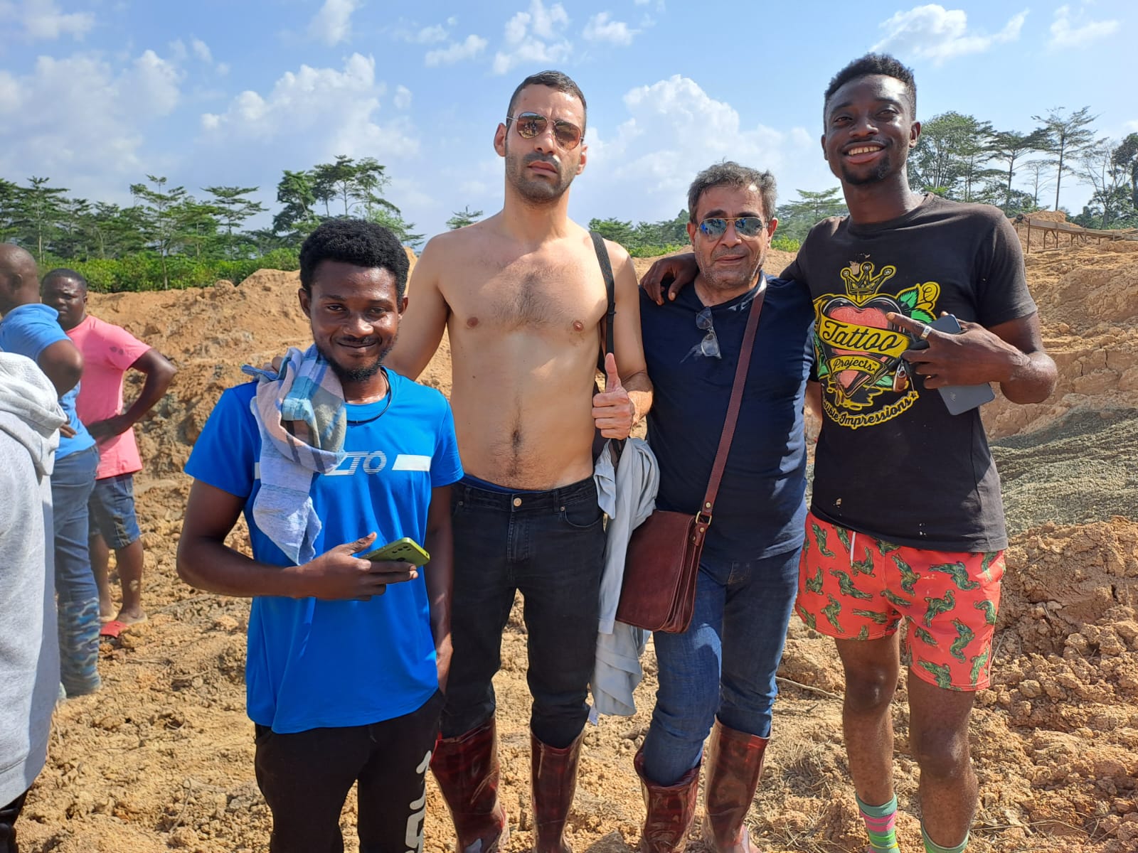With local partners at mine site